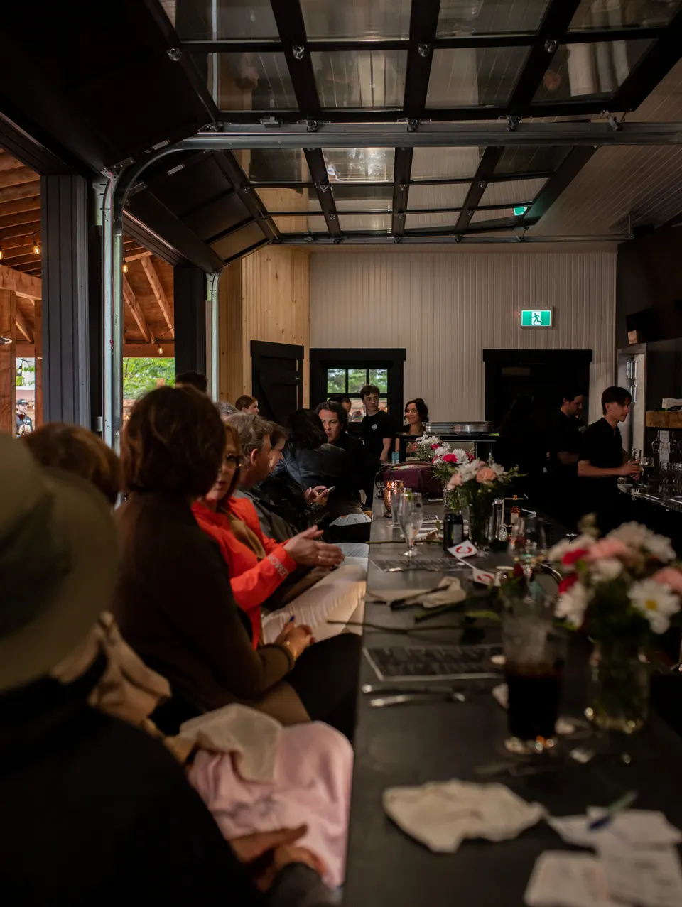 Guests dining indoors at the Lone Oak Beer Garden